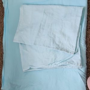 Blue flat sheet and two pillowcases